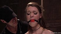 Hot brunette babe Nora Riley with big tits and pierced nipples made by master suck huge dick to his assistant then fuck as slave